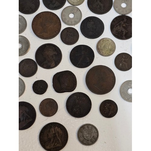 63 - Mixed World coins to include William III, George I, II, III, IV, William IV, and Victorian copper co... 