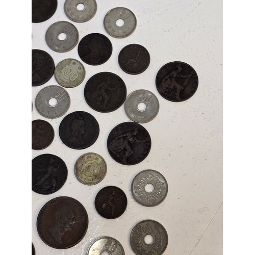 63 - Mixed World coins to include William III, George I, II, III, IV, William IV, and Victorian copper co... 