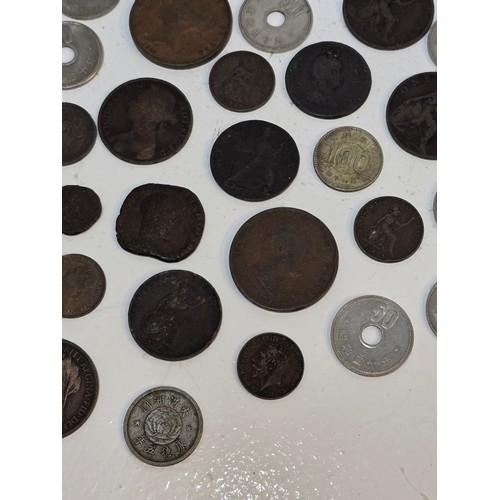 63 - Mixed World coins to include William III, George I, II, III, IV, William IV, and Victorian copper co... 