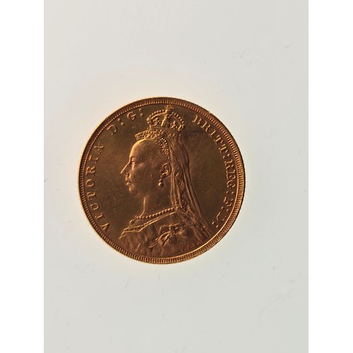 104 - A 22ct replica coin, testing as 22ct gold, 22mm, 8g