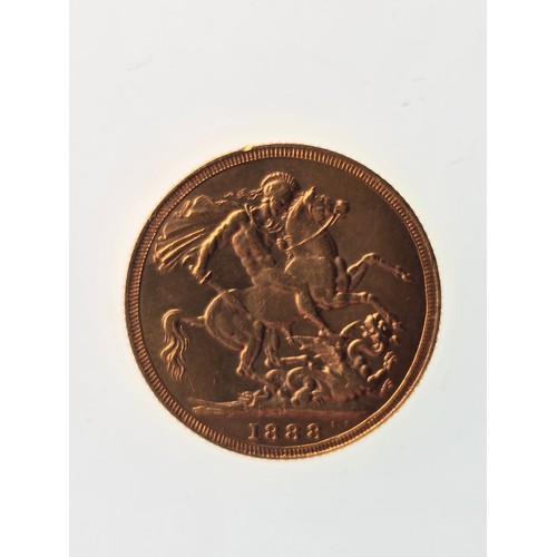 105 - A 22ct replica coin, testing as 22ct gold, 22mm, 8g