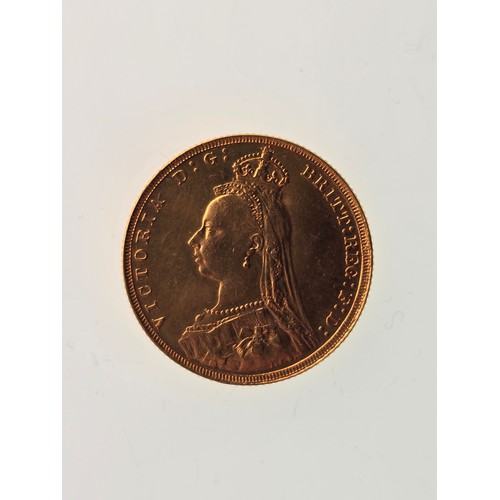 105 - A 22ct replica coin, testing as 22ct gold, 22mm, 8g