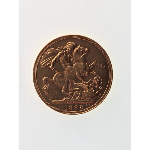 106 - A 22ct replica coin, testing as 22ct gold, 22mm, 8g