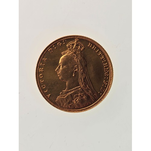 106 - A 22ct replica coin, testing as 22ct gold, 22mm, 8g