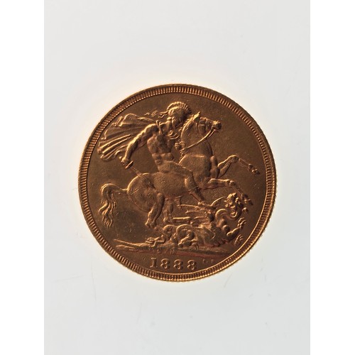 107 - A 22ct replica coin, testing as 22ct gold, 22mm, 8g