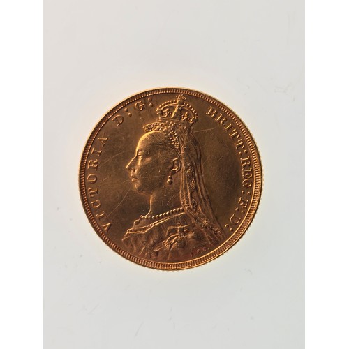 107 - A 22ct replica coin, testing as 22ct gold, 22mm, 8g