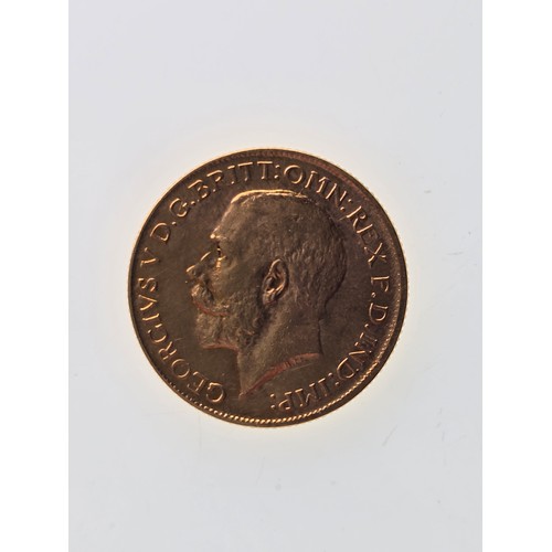 108 - A 22ct replica coin, testing as 22ct gold, 22mm, 8g