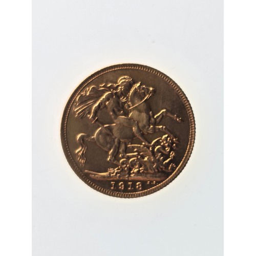 109 - A gold coin fashioned as 1918 Full Sovereign, testing as 22ct gold, 22mm, 8g