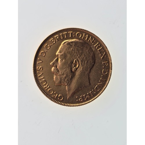 109 - A gold coin fashioned as 1918 Full Sovereign, testing as 22ct gold, 22mm, 8g