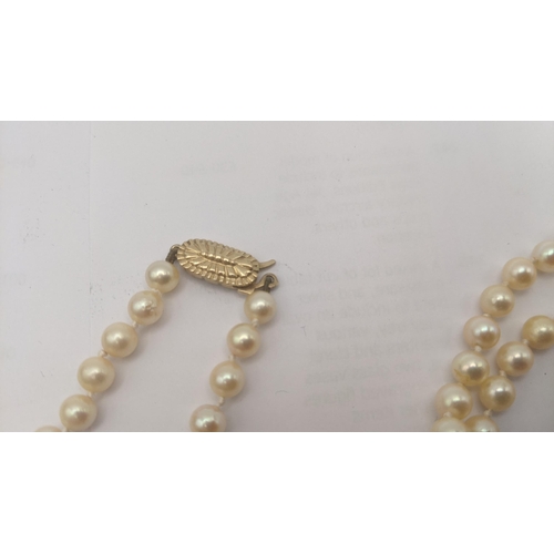 102 - A mixed lot to include a pearl necklace with a 9ct yellow gold clasp together with two white metal p... 