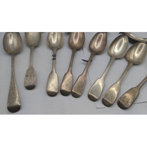 104 - Silver to include a set of fiddle pattern teaspoons, a pir of sugar tongs, two tablespoons and other... 