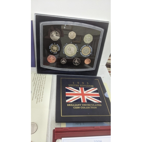 114 - A collection of British coin set to include the United Kingdom Brilliant uncirculated coin collectio... 