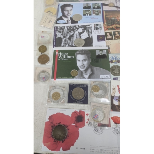 115 - A collection of British Commemorative coin sets, covers and proofs to include the 50th anniversary o... 