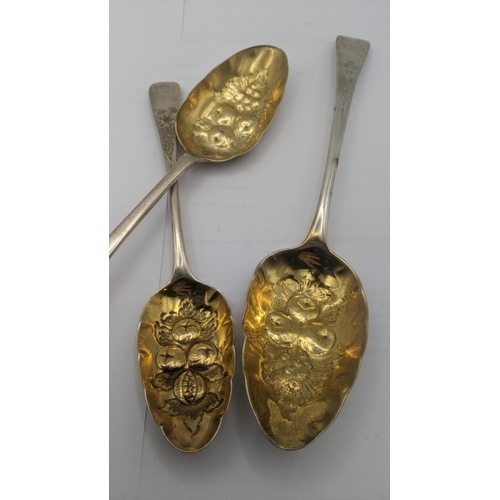 123 - George III silver berry spoons, one hallmarked London 1802, all have embossed gilded bowls floral en... 