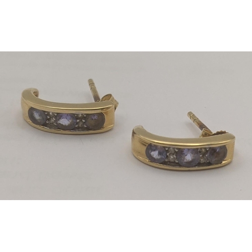 13 - A pair of 18ct yellow gold stud earrings set with diamonds and blue coloured paste stones 2.8g
Locat... 