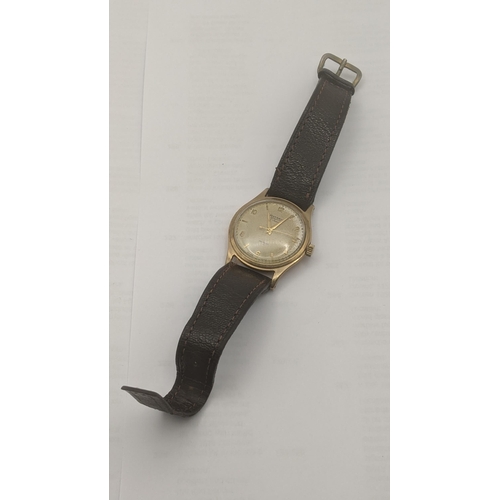 16 - 9ct yellow gold cased gents Rotary wrist watch on a brown leather strap., total weight 37.7g
Locatio... 