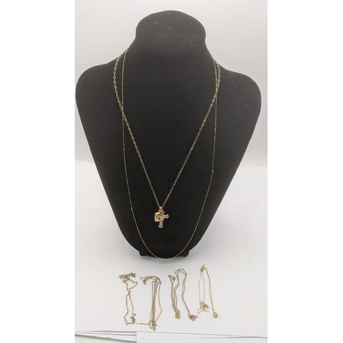 163 - A group of 9ct yellow gold fine line necklaces, some having yellow metal pendants, 8.5g
Location:CAB... 