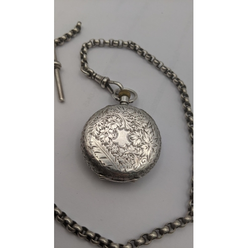 178 - A Victorian silver ladies open faced pocket watch having floral engraved decoration to the case, a g... 