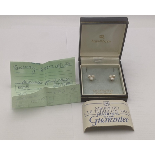 18 - A pair of Mikimoto cultured pearl and 9ct yellow gold stud earrings with box A/F
Location:C4
If ther... 