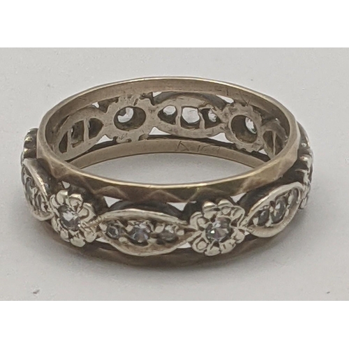 191 - A 9ct white and yellow gold eternity ring set with paste stones, 3.2g
Location: RING 2
If there is n... 