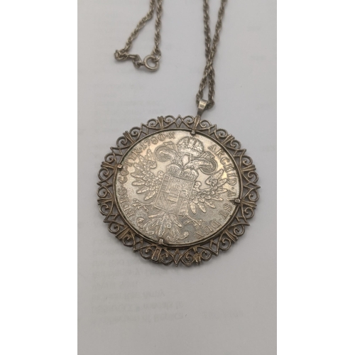 20 - A 1780 Austrian Maria Theresa silver coin mounted in a silver pendant on a sterling silver necklace ... 