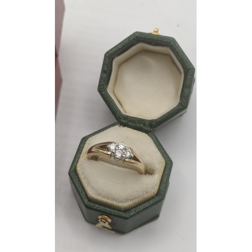 25 - Two 9ct yellow and white gold ladies rings to include an example set with four brilliant cut diamond... 