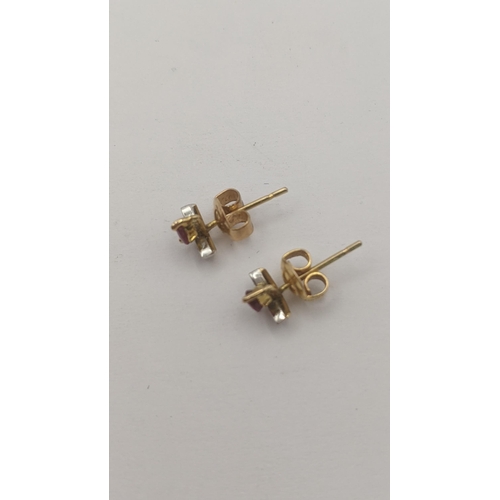 285 - A pair of ruby and diamond 14ct yellow gold stud earrings, 1g
Location: C5
If there is no condition ... 