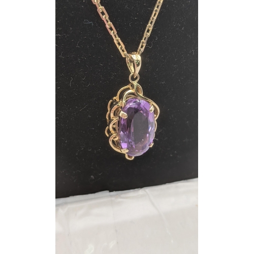 288 - A yellow metal and amethyst pendant, tested as 9ct gold on a 8ct yellow gold necklace, together with... 