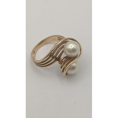 289 - A 14ct yellow gold and twin pearl ring, size N 1/2, 5.2g
Location: RING 2
If there is no condition r... 