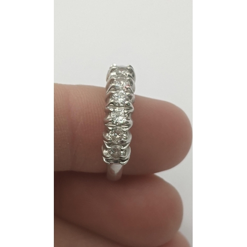 295 - A six stone diamond and 14ct white gold diamond ring, size M 1/2, 3.2g
Location: RING 2
If there is ... 