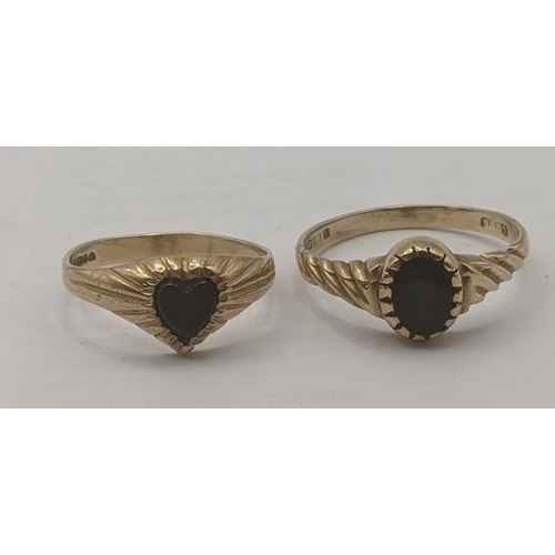 34 - Two 9ct yellow gold and black onyx signet rings one in a heart shape 3.4g
Location:RING1
If there is... 