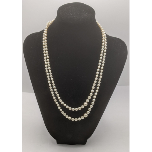 43 - A double strand of graduated pearls necklace on 9ct yellow gold and garnet clasp
Location:CAB
If the... 