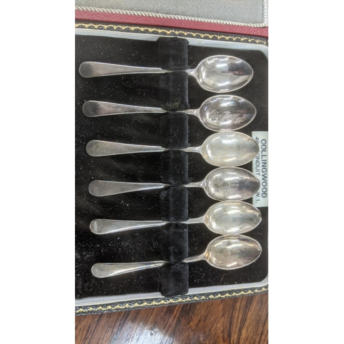 45 - Two cased sets of silver spoons to include a set of six sterling silver and enamel coffee spoons fro... 