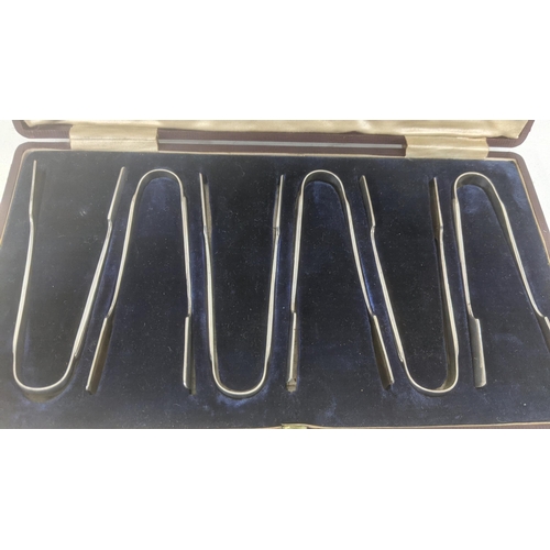 49 - A set of six  James Dixon and Sons silver asparagus tongs hallmarked 1902, housed in a fitted case, ... 