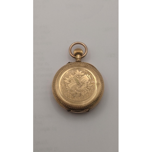 5 - An 18ct yellow gold open faced keyless ladies fob watch having engine turned borders and engraved de... 