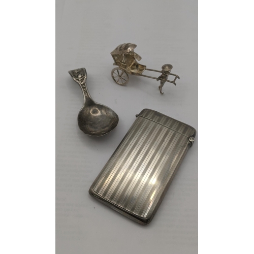 58 - Mixed silver and white metal items to include a small silver card case engraved with the letter 