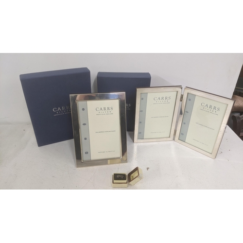 63 - Two Carrs of Sheffield silver photo frames with boxes and a silver ring
Location:A4M
If there is no ... 