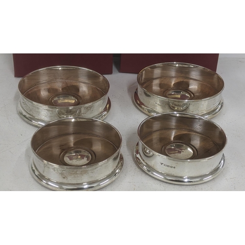 64 - Four brian Fuller silver wine coasters with boxes
Location:A4M
If there is no condition report, plea... 