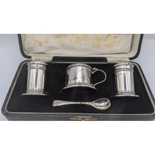 69 - Silver to include a three piece cruet set hallmarked Birmingham 1934 in a fitted case together with ... 