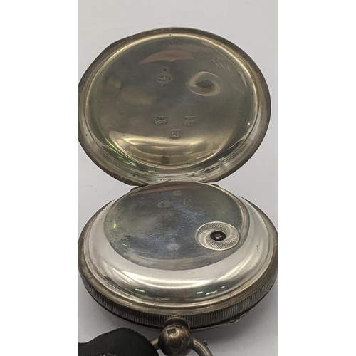 72 - A Victorian silver open faced pocket watch hallmarked Chester 1876 with key
Location:CAB2
If there i... 