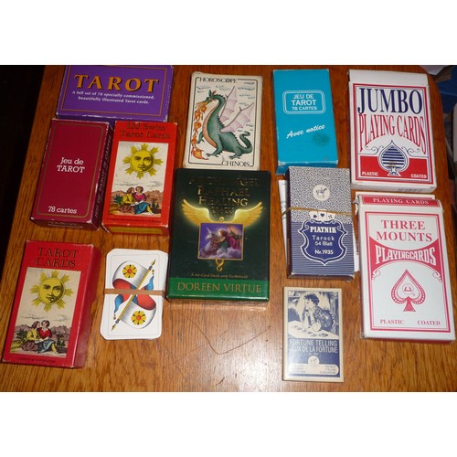 319 - Over 300 assorted multi themed packs of playing cards includes Tarot cards
Location: GR
If there is ... 