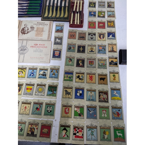 302 - A quantity of Whitbread's Inn sign collectors cards, third series from a set of 50 (metal) approx 87... 