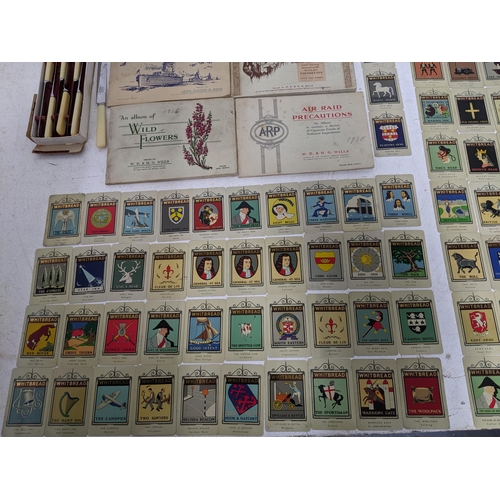 302 - A quantity of Whitbread's Inn sign collectors cards, third series from a set of 50 (metal) approx 87... 