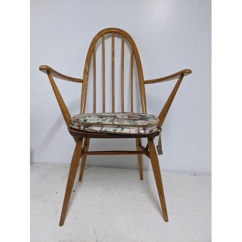 315 - An Ercol Quaker dining chair with loose upholstered seat and late mid-century Ercol dark wood armcha... 