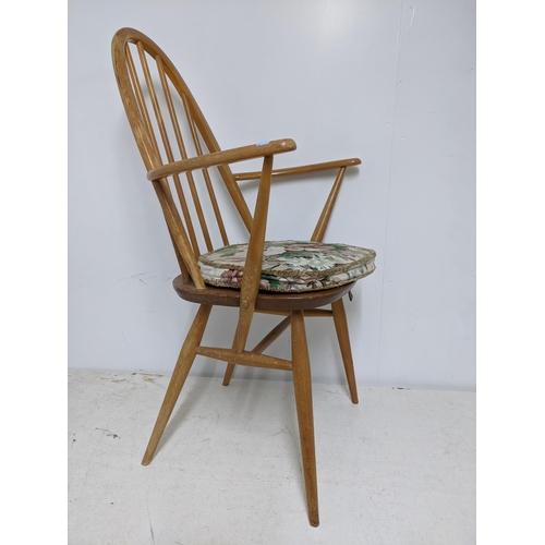 315 - An Ercol Quaker dining chair with loose upholstered seat and late mid-century Ercol dark wood armcha... 