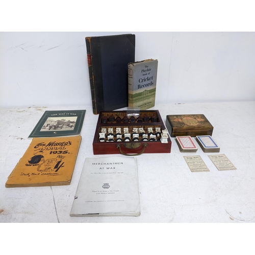 329 - ***THIS LOT HAS BEEN WITHDRAWN***A mixed sporting and ephemera lot to include a Chinese chess set wi... 