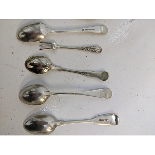 273 - A group of hallmarked silver flatware to include four teaspoons, a cake fork a pair of sugar tong, 1... 