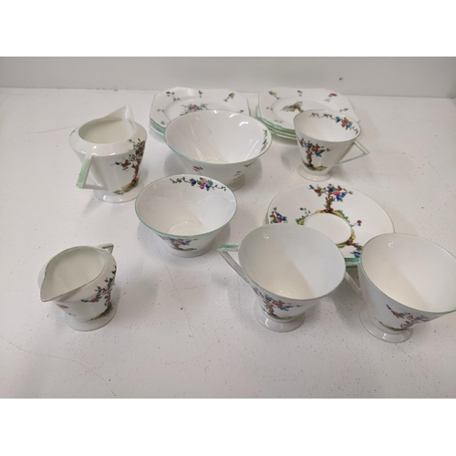 395 - A Shelley part tea set decorated with an apple tree and flowers
Location: 1-3
If there is no conditi... 