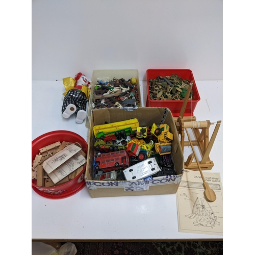 417 - A mixed lot of toys to include a box of diecast vehicles to include a Corgi 007 Lotus Espirit and ot... 