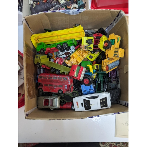 417 - A mixed lot of toys to include a box of diecast vehicles to include a Corgi 007 Lotus Espirit and ot... 